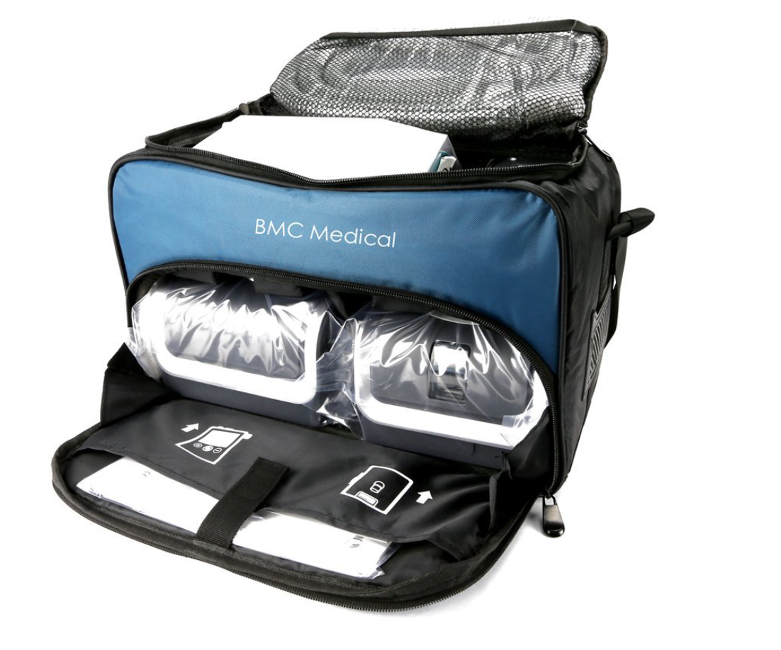 BMC GII Auto CPAP Machine inside blue and black BMC Medical carrying case with clear plastic covers