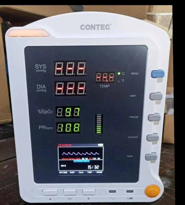Contec CMS 5100 patient monitor with digital display showing vital signs including blood pressure and oxygen levels