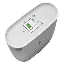 Close-up of Philips SimplyGo Mini Portable Oxygen Concentrator humidifier bottle attached to the machine