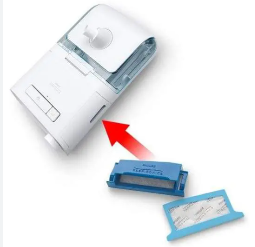 Philips Respironics Ultra Fine Filters for Dreamstation with blue filter cases beside CPAP machine