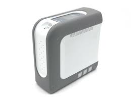 Devilbiss igo 2 Portable Oxygen Concentrator in gray and white with digital display and control buttons
