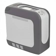 Devilbiss igo 2 Portable Oxygen Concentrator showing close-up of humidifier bottle attachment