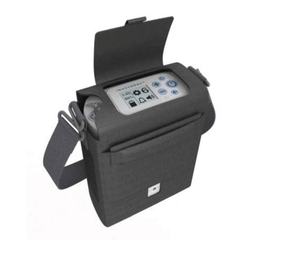 Inogen One G5 Portable Oxygen Concentrator with digital display and shoulder strap in black