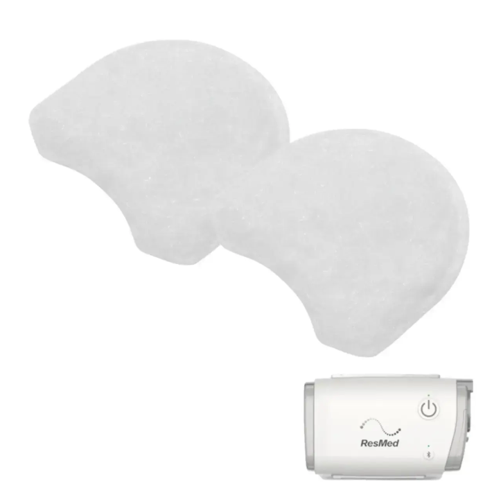 White replacement Air Filter For BMC CPAP and BIPAP shown with a ResMed CPAP machine
